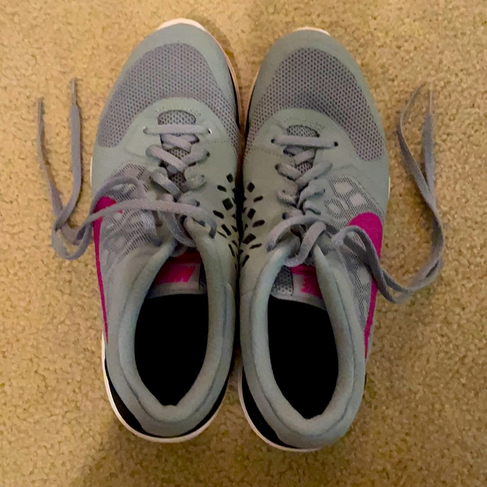 Nike sport shoes. Gray w/ pink and purple swoosh.